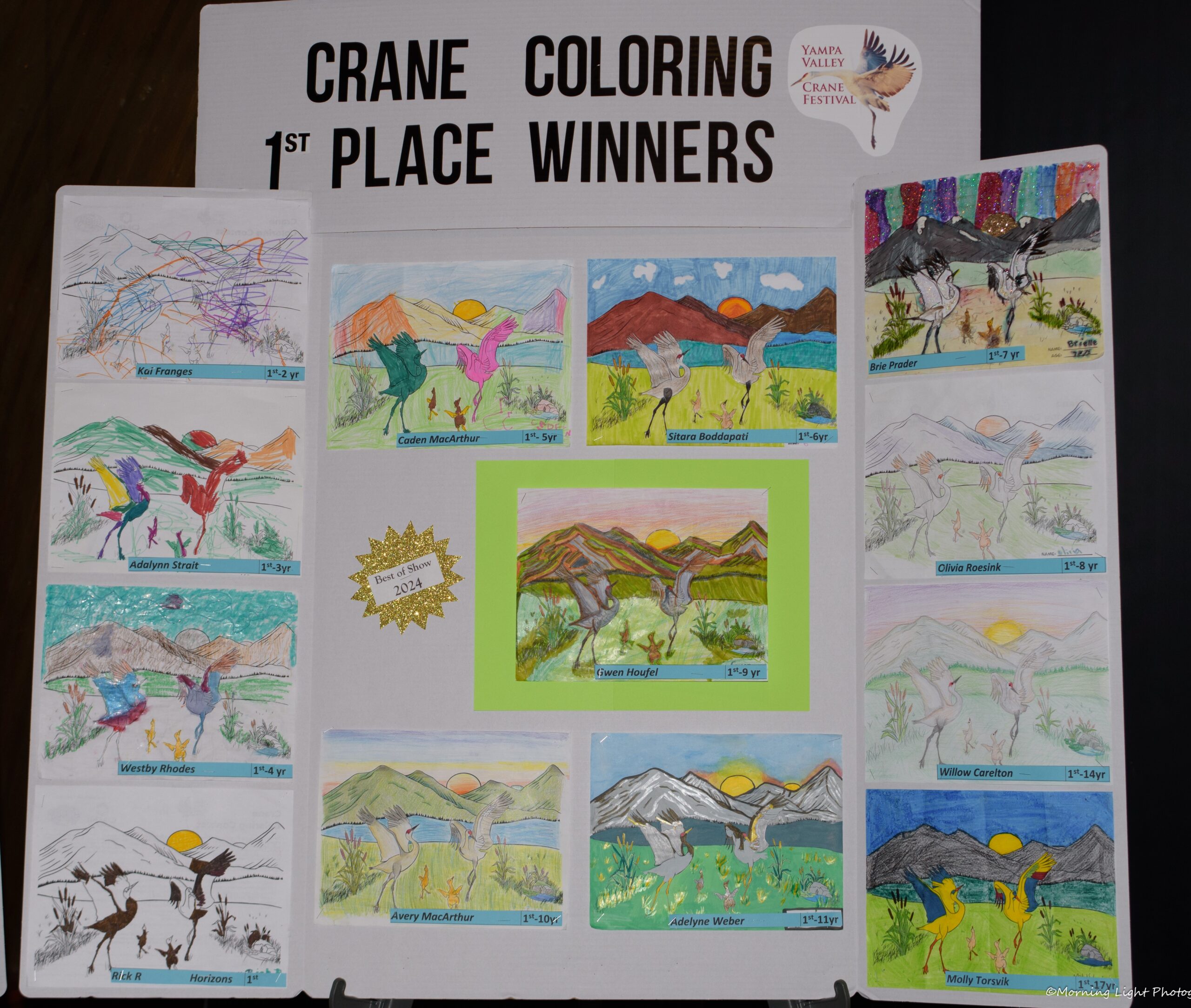 Photo of winning coloring contest entries.